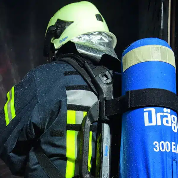 Zoomed In Shot Of Worker Using PSS 5000 Breathing Apparatus