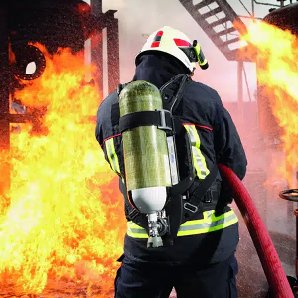 Firefighter Using PSS 5000 Breathing Apparatus - Rear View